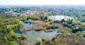 Nature and landscape: Aerial view of a forest and lakes, green and trees in a wild landscape. Royalty Free Stock Photo