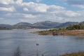 Nature landscape of lake, dam with people fishing