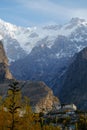 Baltit fort and snow capped Karakoram mountain range in the background, Hunza valley. Gilgit Baltistan, Pakistan Royalty Free Stock Photo