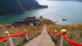 Nature landscape view Heaven Lake of Celestial Mountains and Taoist Heavenly Queen Mother temple in Xinjiang China Royalty Free Stock Photo