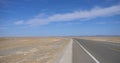 Nature landscape view of high way road under sunny blue sky in Dunhuang Gansu China