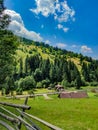 Nature mountain landscape with forest and blue cloudy sky for travel lovers