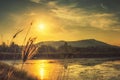 Nature with mountains rivers grass the light of the sunset Royalty Free Stock Photo