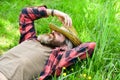 Nature is my home. Rest in countryside. Farmer bearded man rest after day work. Farmer relax on green grass. Ecology