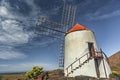 characteristic windmill in a cactus town in lanzarote, spain