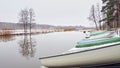 Nature of Northern Europe, lake, early spring, light fog, reflection in the water. Royalty Free Stock Photo