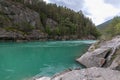 Nature of Norway. Mountain river with clear water. Rocky slope with a picturesque waterfall. Hiking in Norway. Scandinavian nature Royalty Free Stock Photo