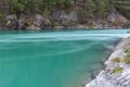 Nature of Norway. Mountain river with clear water. Rocky slope with a picturesque waterfall. Hiking in Norway. Scandinavian nature Royalty Free Stock Photo