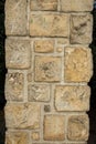 A nature old stone wall of different stones for background