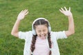 Nature is the one song of praise that never stops singing. Happy song singer on green grass. Little girl singing song Royalty Free Stock Photo