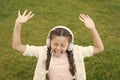 Nature is the one song of praise that never stops singing. Happy song singer on green grass. Little girl singing song Royalty Free Stock Photo