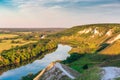 Nature panorama landscape, canyon with chalk hills or mountains, green meadows and river, summer travel