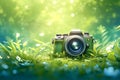 Nature photographer Green camera on grass with bokeh background