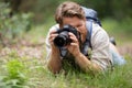 nature photographer at work in field Royalty Free Stock Photo