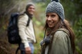 Nature portrait, happy woman or couple on hiking journey, travel adventure or mountain climbing walk. Woods, love or