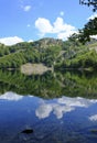 Lake Santo, Nature reflects on the surface of the lake. National park Appennino Tosco-Emiliano. Lagdei, Emilia-Romagna