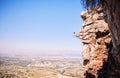 Nature, rock climbing and space with man on mountain for fitness, adventure and challenge. Fearless, workout and hiking