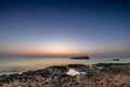 Nature\'s Spotlight: Glistening Pools Amidst Rocky Shores in Crete