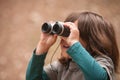 Nature's Watchful Eye: Exploring with Binoculars Royalty Free Stock Photo