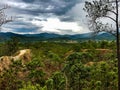 Nature sandstone pai canyon rain forest trees hills cliffs rocks fields green background mountains hills clouds sky sun Royalty Free Stock Photo