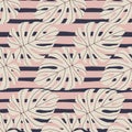 Nature seamless creative pattern with tropical monstera leaf silhouettes. Doodle botanic print with striped navy blue and pink