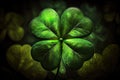 nature symbol of good luck and fortune four-leaf green clover on blurry background