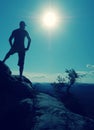 Nature trail runner in t-shirt and shorts watching lazy morning Royalty Free Stock Photo