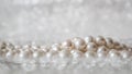 Nature white pearl beads on sparkling background Royalty Free Stock Photo