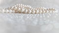 Nature white pearl beads on sparkling background Royalty Free Stock Photo