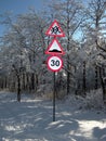 Nature in winter, after snowfall, road signs