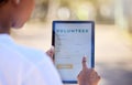 Nature, woman and a tablet for volunteering registration, checklist or signup on a screen. Hands, environment and a