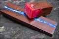 Nature wood with casting epoxy resin blue and red and stabilizing