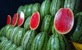 Nature's Beauty: Half-Cut Green Watermelon with Bright Red Flesh