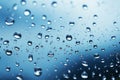 Natures contrast Raindrops on glass, blue sky and gloomy weather Royalty Free Stock Photo