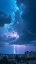 Natures fury Lightning bolt strikes over the city during thunderstorm Royalty Free Stock Photo
