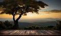 Natures tableau wooden table framed by sunset, sky, tree, mountains Royalty Free Stock Photo