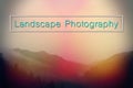 Naturescape and Words of Landscape Photography with Typography Lettering over Mountains Royalty Free Stock Photo