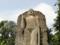 statute of budda carved in single stone standing in the city of colombo, in sri lanka