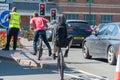 Youths doing stunts on bicycles on main roads in stratford upon avon Royalty Free Stock Photo