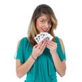 Naughty Brazilian woman shows winning royal flush poker cards Royalty Free Stock Photo