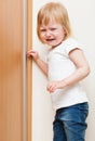 Naughty child is standing in the corner Royalty Free Stock Photo