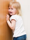 Naughty child is standing in the corner Royalty Free Stock Photo