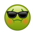 Nauseated face with sunglasses Large size of yellow emoji smile Royalty Free Stock Photo