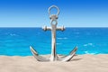 Nautical Anchor on the Sand Sunny Beach. 3d Rendering Royalty Free Stock Photo