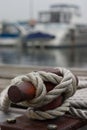 Nautical Cleat closeup with boat in background