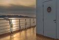 Nautical cruise ship deck lighting metal and brass exterior fixtures.