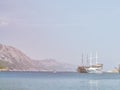 Nautical cruise yachts in the Mediterranean sea bay. Marine recreational cruise vessels in the sunny afternoon