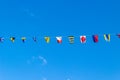 Nautical flags against sky