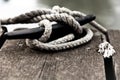 Nautical rope on the cleat. Royalty Free Stock Photo