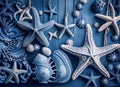 Nautical Sea Star and Shell Arrangement on Blue Background Royalty Free Stock Photo